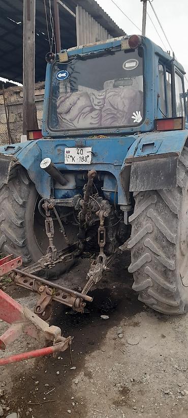 kreditlə masinlar: Mavi rəngli MTZ tipli təkərli traktor Xüsusiyyətlər: - Dizel — 4