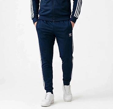 Adidas trenerka – donji deo (muški) - Model: klasični „track pants“ na lalafo.rs Adidas trenerka – donji deo (muški) - Model: klasični „track pants“