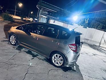 кю 7: Honda Fit: 2009 г., 1.5 л, Автомат, Бензин, Хэтчбэк — 5