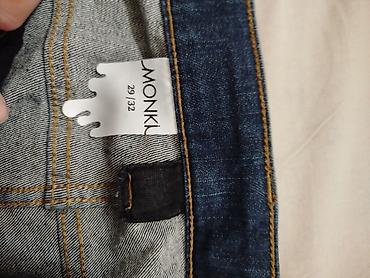 Джинсы: Джинсы классического кроя из плотного денима темно‑синего цвета. - — 5