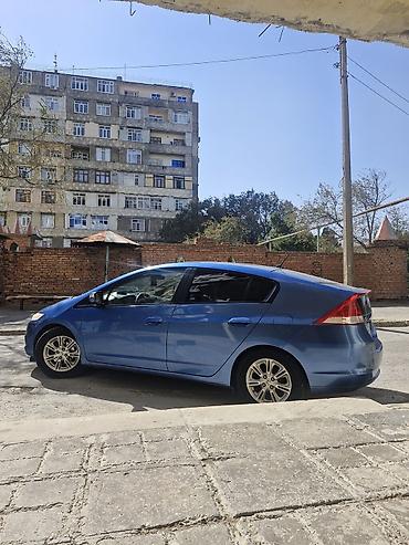 165 60 14: Honda Insight hibrid hetçbek, mavi rəngdə təqdim olunur. Avtomobilin — 9