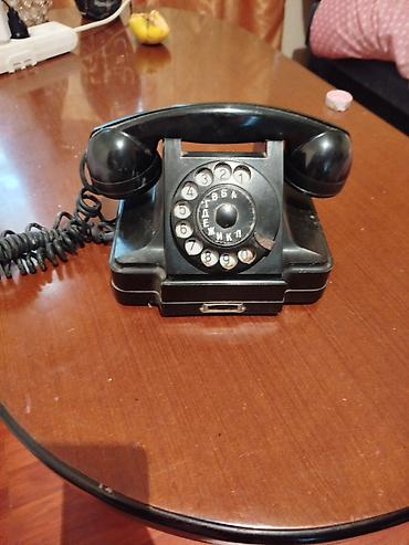 ps1 disk: Klassik diskli masa telefonu - Retro dizaynlı, qara rəngdə masaüstü — 1