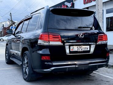 авто лизинг рассрочка: Черный внедорожник Lexus LX 570. Этот полноразмерный люксовый