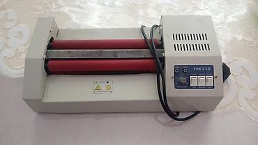 Laminatorlar: FGK 230 modeli laminator. Bu cihaz sənədləri və digər materialları — 2