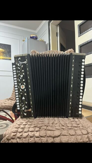 işlənmiş qarmon: Qarmon, Yeni, Ünvandan götürmə