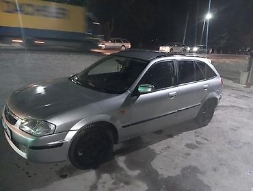 обмен демио: Mazda 323: 1999 г., Механика, Бензин, Универсал — 1