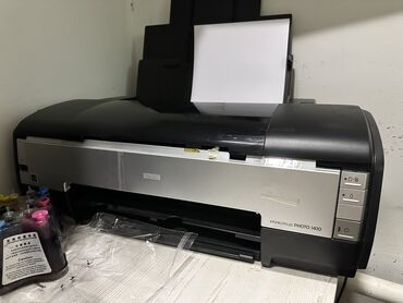 модем saima: А3 Фото принтер Epson 1410, б/у. 
Печатает отлично без нареканий!