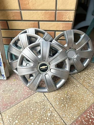 chevrolet spark: Chevrolet üçün orijinal təkər qalpaları (hubcap) komplekti - Rəng — 1
