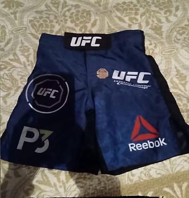 herbi geyim: UFC/Reebok döyüş şortu - Rəng: tünd mavi, yan hissələrdə qara — 1