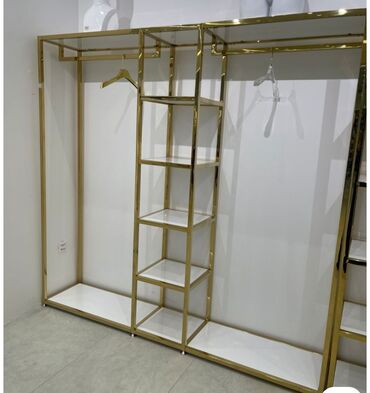 Mağaza asılqanları: Paltar asmaq üçün nəzərdə tutulmuş metal konstruksiyalı asılqan. Bu — 3