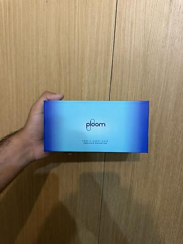 ploom case: Ploom – tütün çubuqları üçün qızdırma cihazı və dəbli daşıma seti — 1