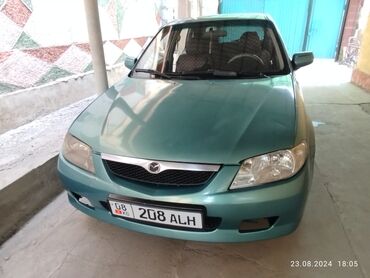 рассрочка тико: Mazda 323: 2002 г., 1.6 л, Механика, Бензин, Хетчбек