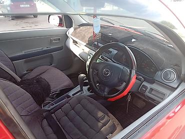 e34 4 4: Mazda Demio: 2003 г., Бензин, Хэтчбэк — 5