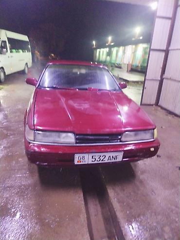 Oldsmobile: Mazda 626: 1990 г., Кол менен иштөөчү, Бензин, Седан — 6
