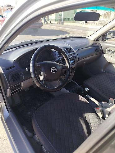 мазла: Mazda 323: 2002 г., 1.6 л, Механика, Бензин, Хэтчбэк — 4