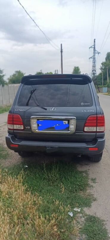 руль для скутера: Автомобиль Lexus LX 470, выполненный в тёмно-сером цвете, представляет