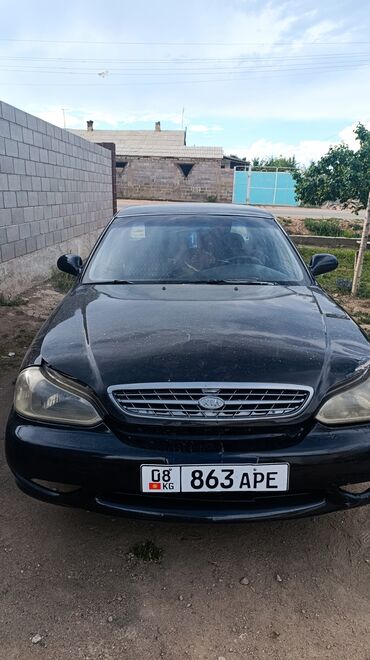 авто машына: Kia : 1999 г., 1.8 л, Механика, Бензин, Седан