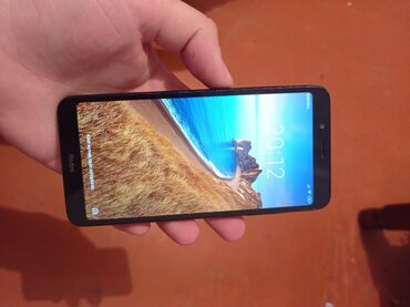 Xiaomi Redmi 7A | İşlənmiş | 16 GB | rəng - Qara 
 | Zəmanət, İki sim kartlı, Sənədlərlə