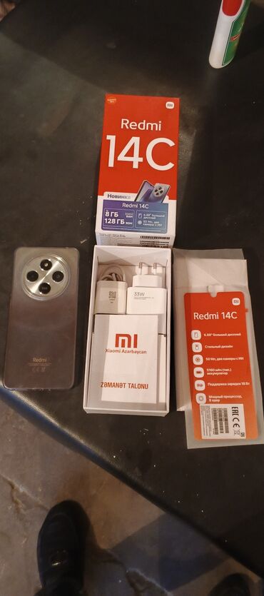 Xiaomi: Xiaomi Redmi 14C, 
 Barmaq izi