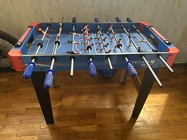 İdman və hobbi: Stolüstü futbol (foosball) masası ideaı qalib 8 cubuqludur — 2