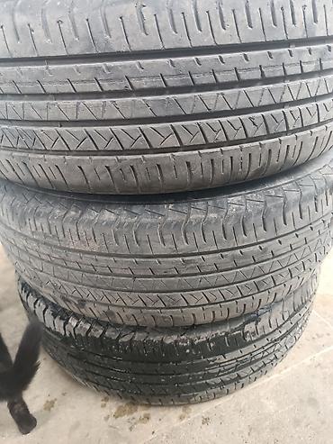 diski teker type 1: 225/60 R18 ölçüdə avtomobil şinləri. Şinlərin üzərində M+S işarəsi — 3