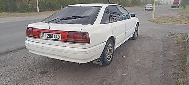 w210 430: Mazda 626: 1990 г., 2 л, Механика, Бензин, Седан — 6