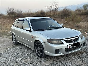 жук жабан: Mazda Familia: 2003 г., 1.6 л, Механика, Бензин, Универсал — 1