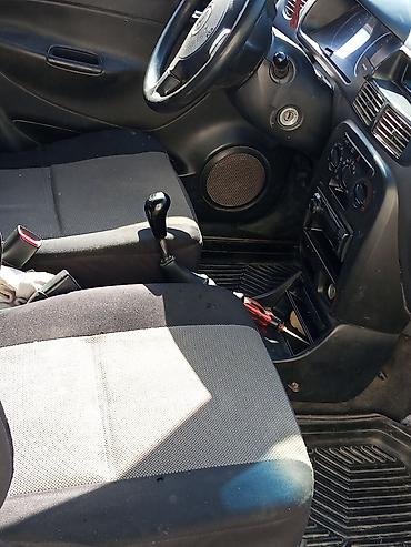 Daihatsu: Daihatsu Cuore: 2003 г., 1 л, Механика, Бензин, Хэтчбэк — 13