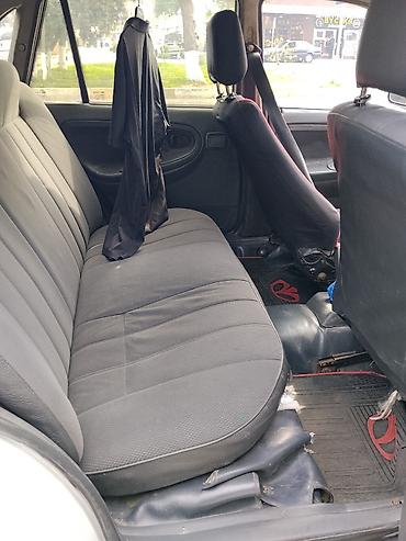 Daewoo: Daewoo Nexia: 1.5 l | 2007 il Sedan — 17