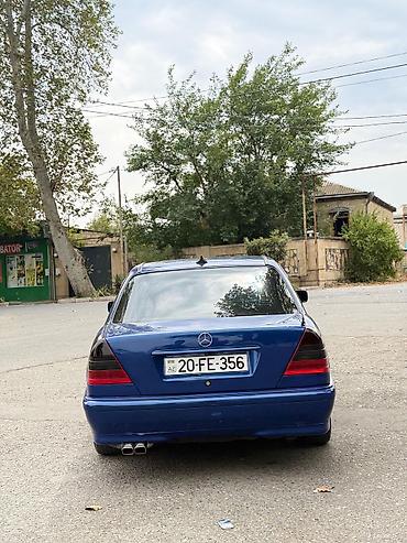 car parking maşın satışı: Mercedes-Benz C-Sinif sedan (W202) — mavi rəng, 4 qapı. Xüsusiyyətlər — 4