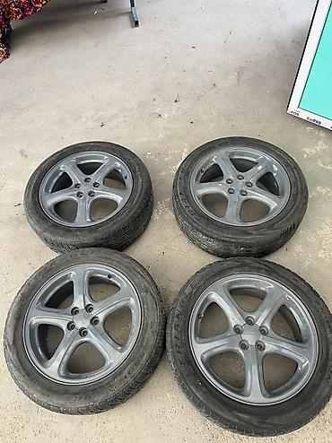 Амортизаторы, пневмобаллоны: Передний амортизатор Subaru — 9