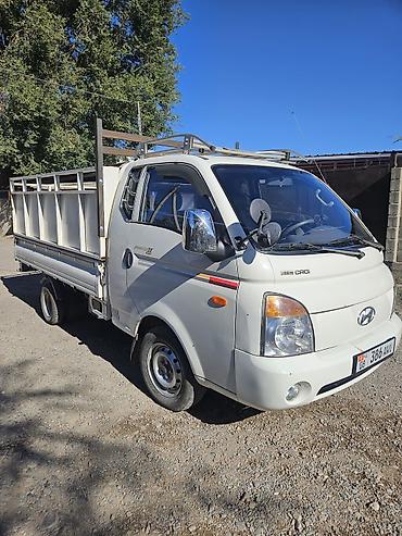 кампрессор воздушный: Hyundai Porter II бортовой грузовик - Дизель CRDi 2.5 (надпись CRDi — 2