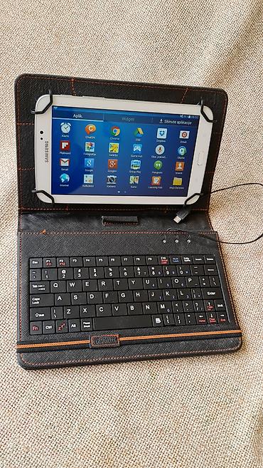iphone tablet: Kožna futrola sa ugrađenom žičnom tastaturom za tablet (oko 7–8 inča) — 7