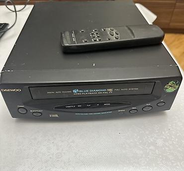 video kaset: Daewoo VHS video maqnitofonu + pult Xüsusiyyətlər: - Model: BLUE — 1