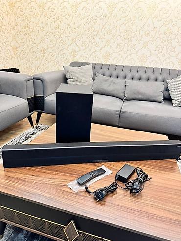 Audio: Samsung soundbar + subwoofer audio sistemi Xüsusiyyətlər: - 2.1 kanal — 1