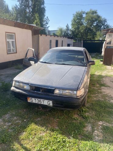 машина 1000: Mazda 626: 1991 г., 2 л, Механика, Бензин, Хэтчбэк