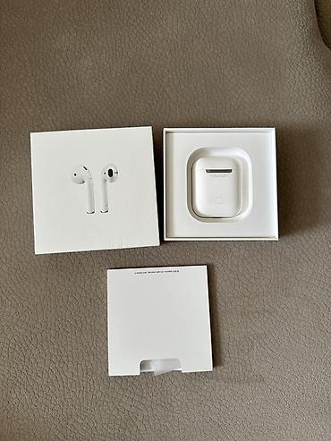 Audio: Apple AirPods (with Charging Case) — Model A2031/A2032, qutu komplekti — 1