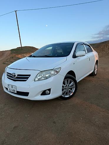 toyota aygo: Toyota Corolla (E140), ağ rəng, sedan gövdə. Xarici: - Orijinal — 8