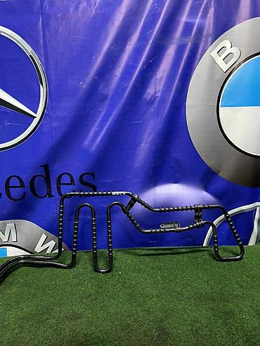 203: Масляный радиатор (теплообменник) гидроусилителя руля Mercedes-Benz — 1
