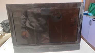 оптом наушник: Компактный ЖК‑телевизор с встроенным DVD‑проигрывателем