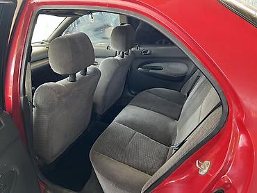 e53 amg: Mazda 323: 1996 г., 1.8 л, Автомат, Бензин, Седан — 4