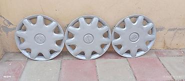 opel tekeri: Məhsul: Opel üçün original disq qapaqları dəsti + yük yerinə (baqaja) — 4