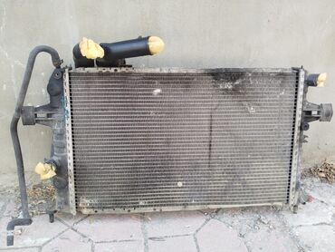 Радиаторы интеркулеров: Avtomobil üçün hazırlanmış bu radiator mühərrikin həddindən artıq