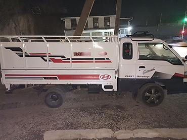 Изготовление рекламных конструкций: Наклейки на портер на заказ г.Ош — 1