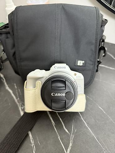 canon eos m50 купить: Беззеркальная камера Canon EOS (белый цвет) с объективом RF-S 18–45mm — 1