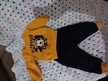 Uşaq idman dəsti - İki hissəli: sarı sweatshirt və qara şalvar -
