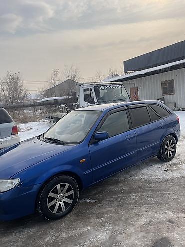 Mazda: Mazda 323: 2000 г., 1.6 л, Автомат, Газ, Хэтчбэк — 2