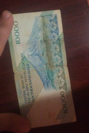 gumuş qaşıq alıram: İran İslam Respublikasının Mərkəzi Bankı – 10,000 rial banknotu Tam