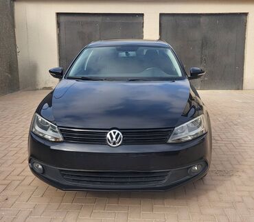 туфли на низком ходу: Volkswagen Jetta: 2 л | 2012 г. Седан
