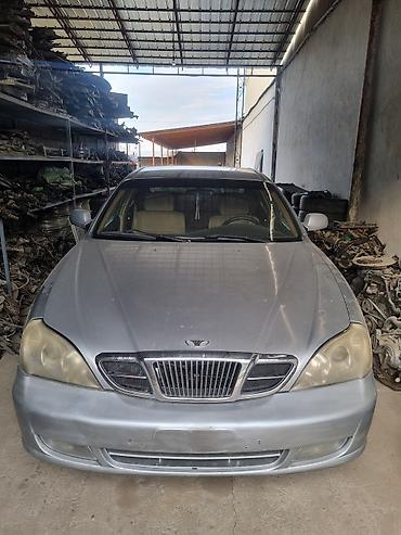 ленивец на вольво: Daewoo Magnus: 2002 г., Бензин, Седан — 4